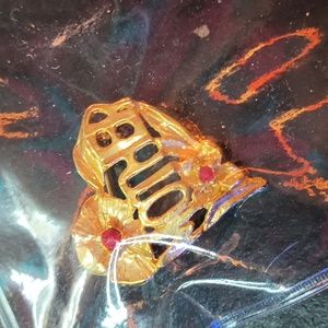 Gold mother brooch red ruby stones